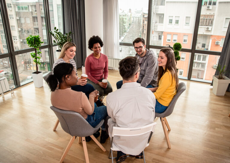 Individuals in a therapy group at the best IOP in Albuquerque