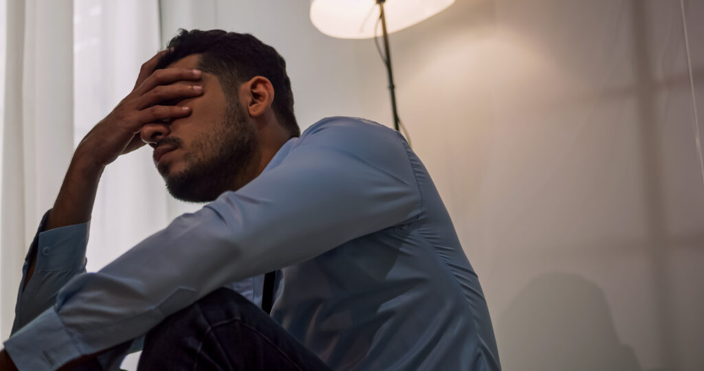 man suffering from signs of depression - Vanguard Behaviorial Health