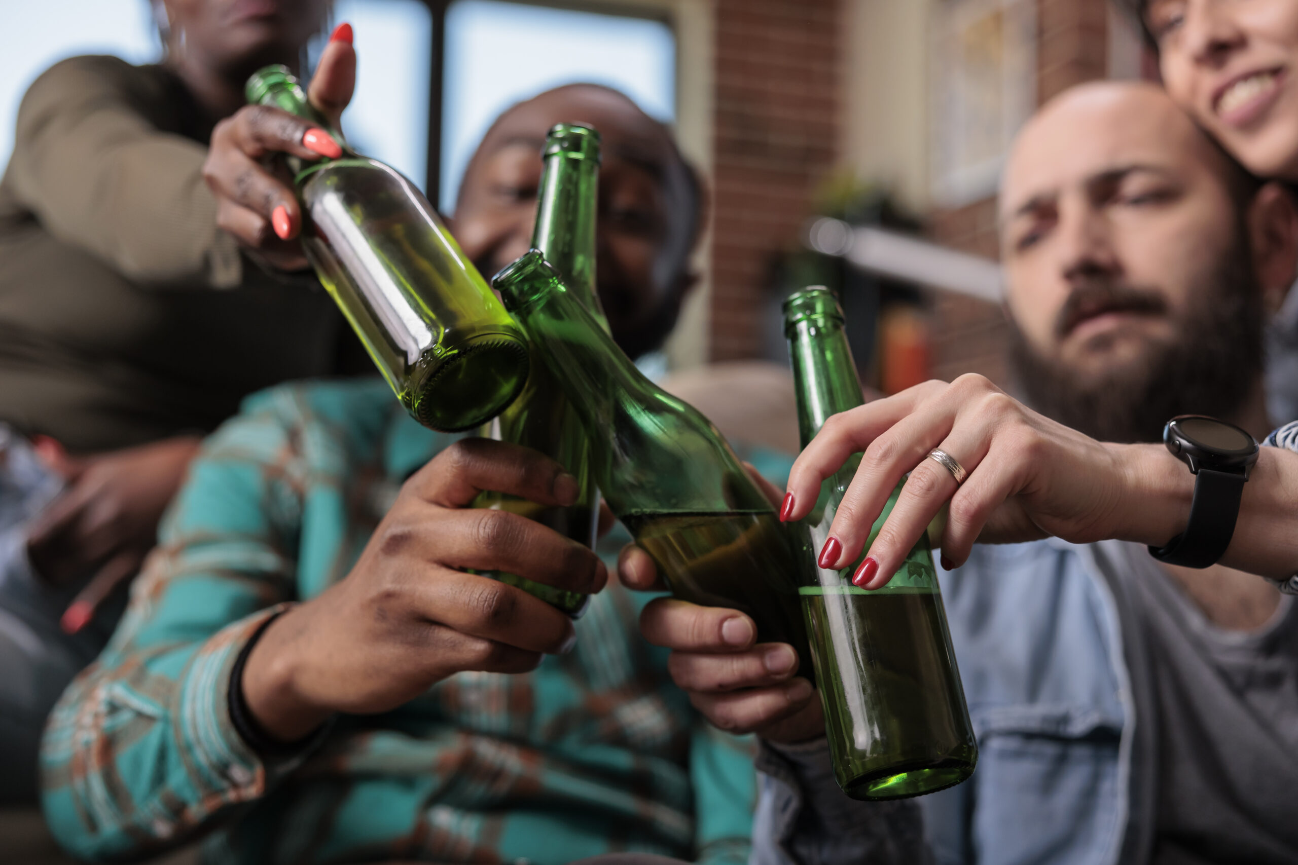 A group of friends showing signs of alcoholism