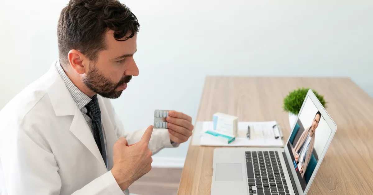Doctor discussing breakthrough depression medication options with patient via telemedicine consultation